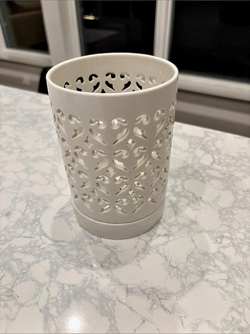 Decorative white ceramic orchid pot
